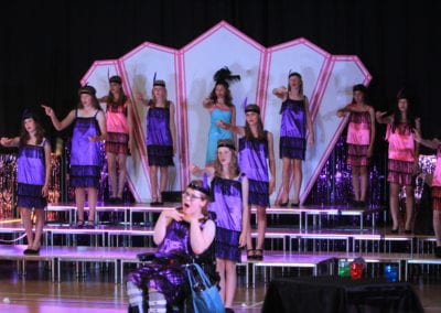 Pupils performing the school's version of Bugsy Malone.