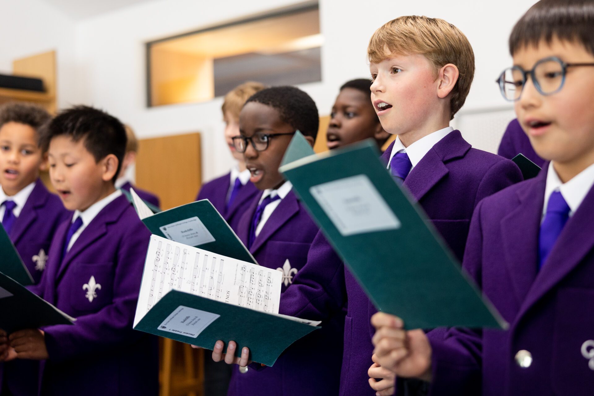 Choristers fitting their robes